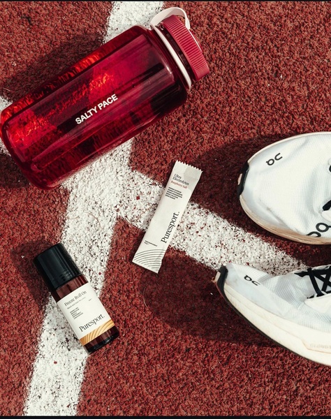 electrolyte powder, muscle recovery roll, water bottle, running shoes, supplement sticks, product demo, flat lay, lifestyle, energetic, fresh, red, neutral